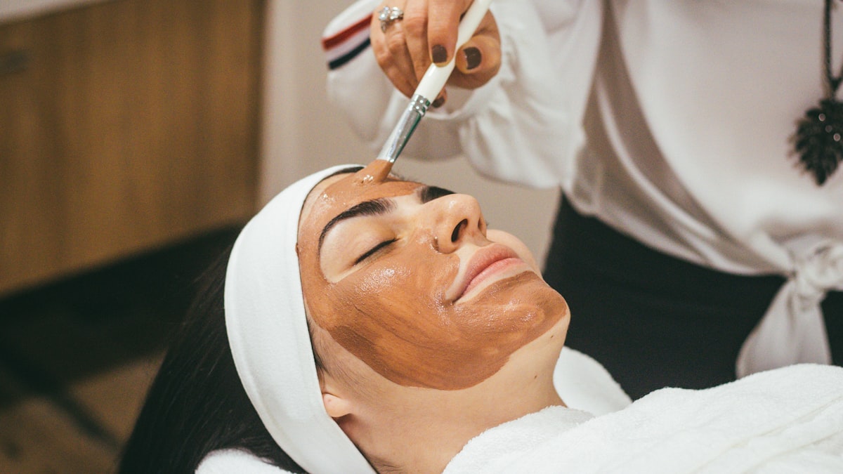 Firming and elasticity skincare jars on natural stone