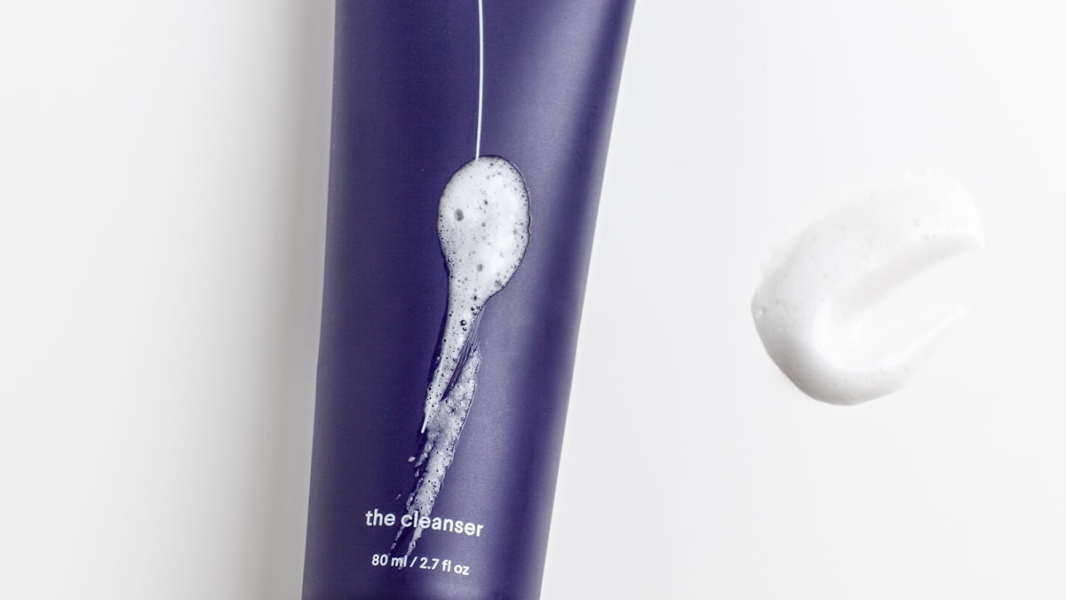 Morning skincare routine essentials arranged on sunlit marble vanity